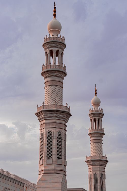 Free Capture of stunning minarets against a serene sky in Al Ain, UAE. Stock Photo