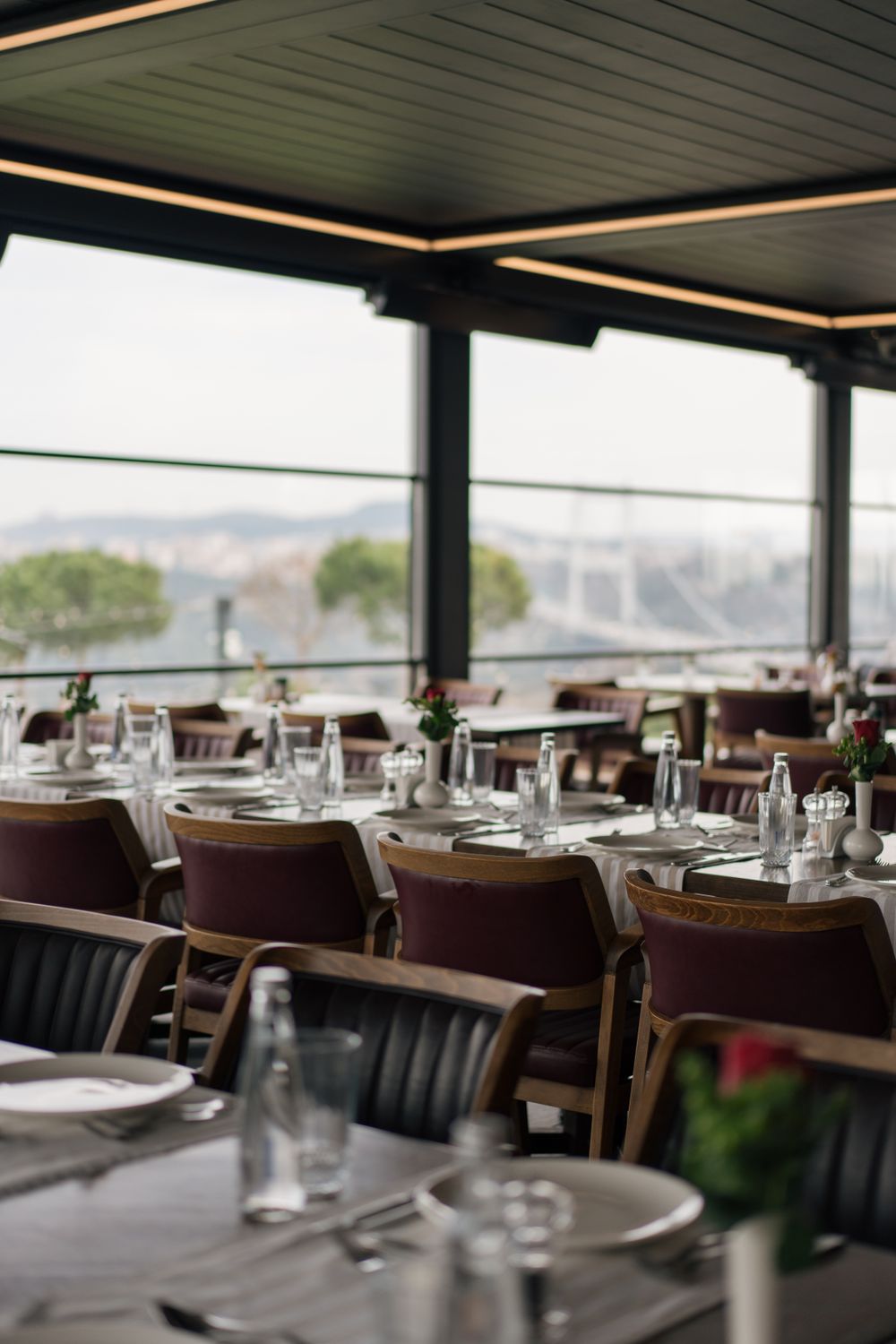 Elegant Restaurant Dining Area with Scenic View · Free Stock Photo