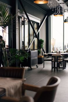 Stylish indoor café in İstanbul featuring chic decor and ample natural light.