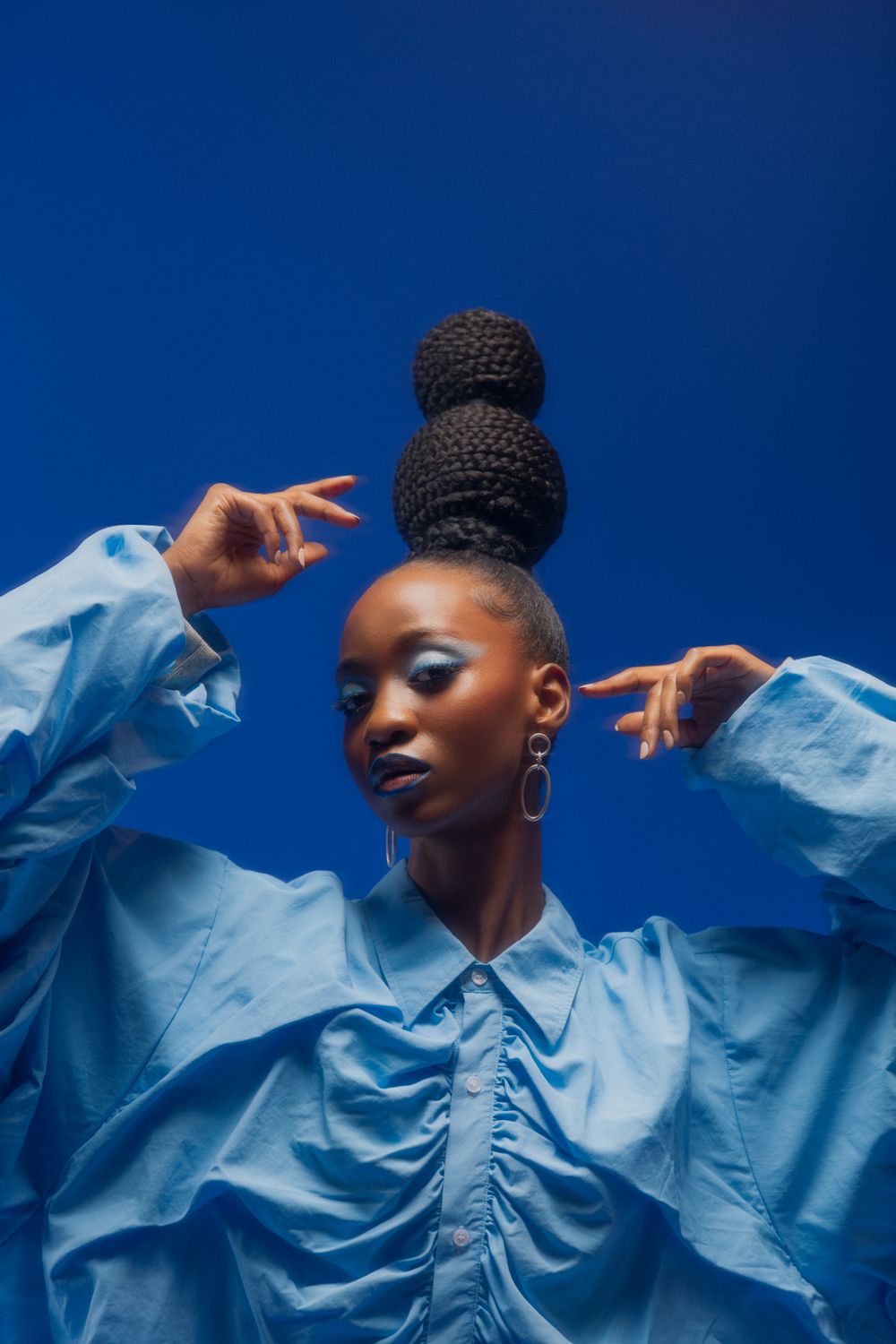 Sleek Low Bun — a hair look on BLK GLO