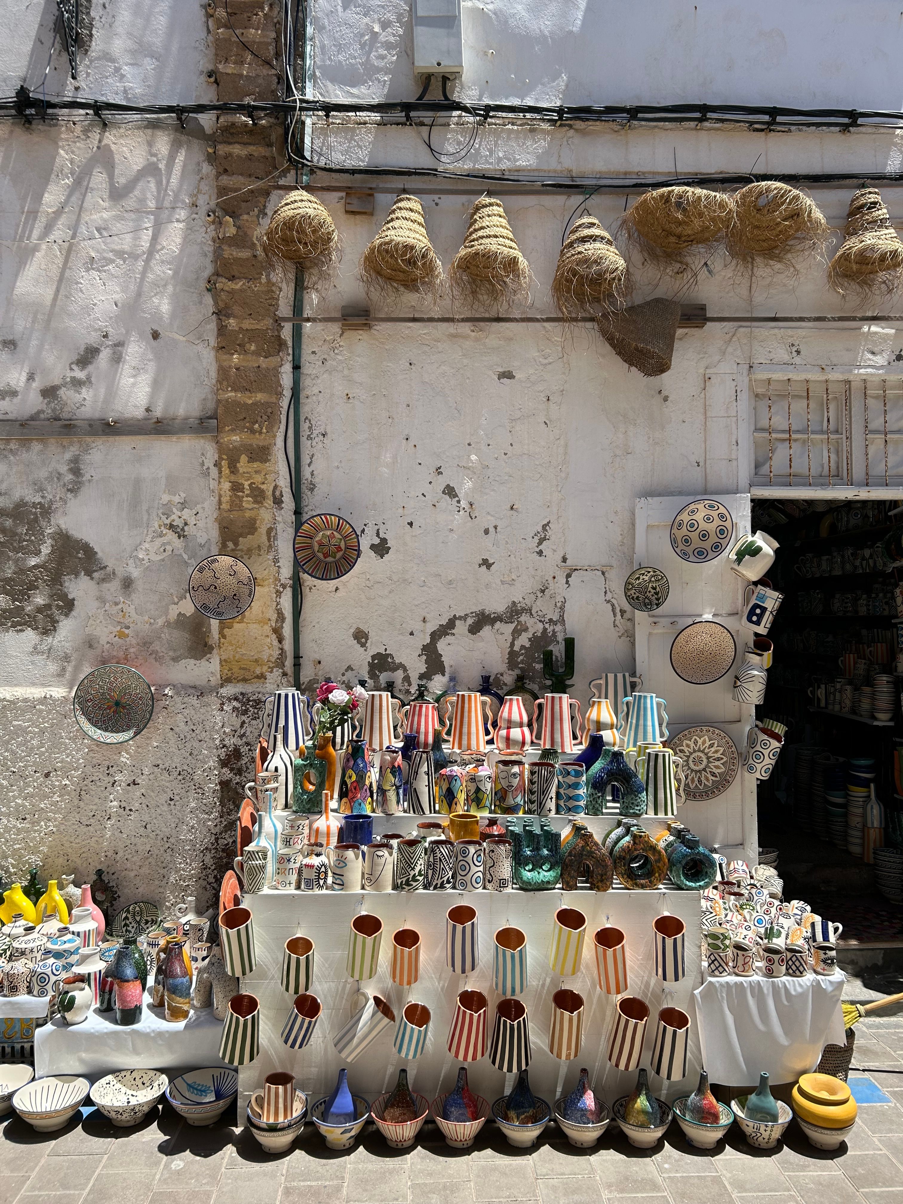 Traditional Moroccan Souk with Ceramics Display · Free Stock Photo