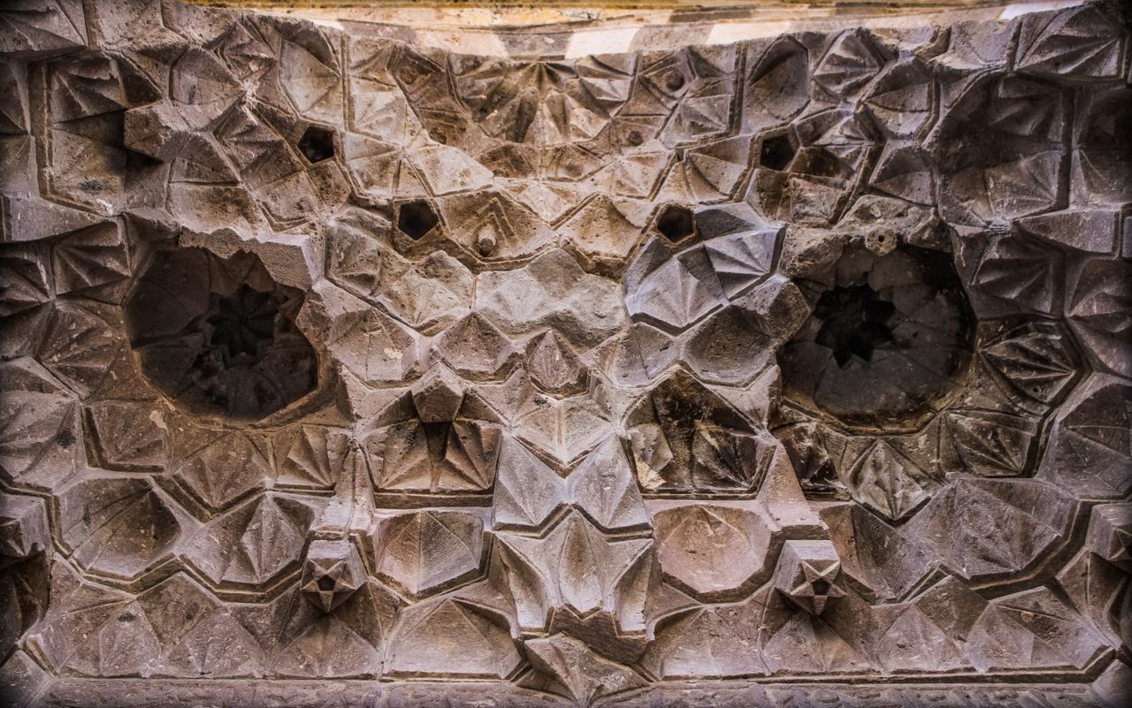 close up of intricate geometric stone patterns in k r ehir t rkiye sho