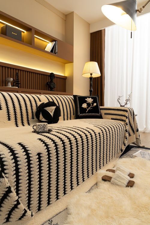 Free Modern living room with a stylish striped sofa blanket in Salt Lake City. Stock Photo