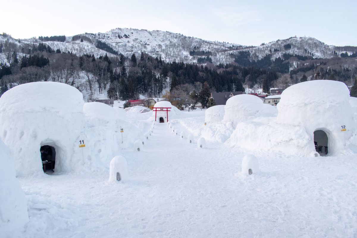 Massive illuminated snow sculpture at a Japanese winter festival