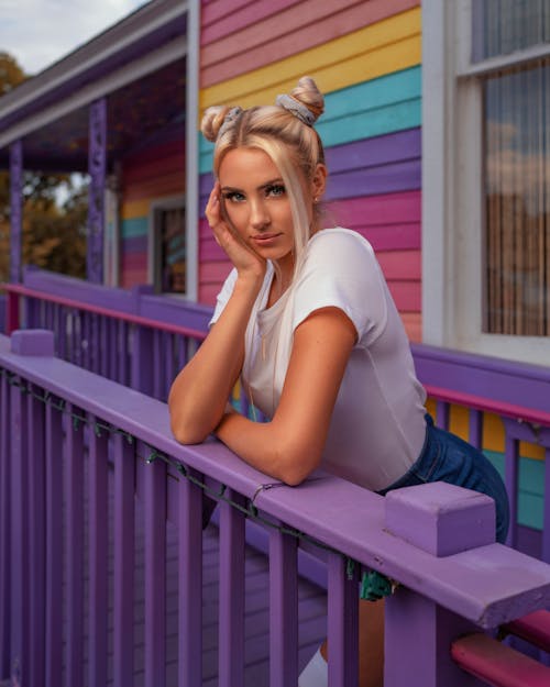 Photo Of Woman Leaning On Handrail