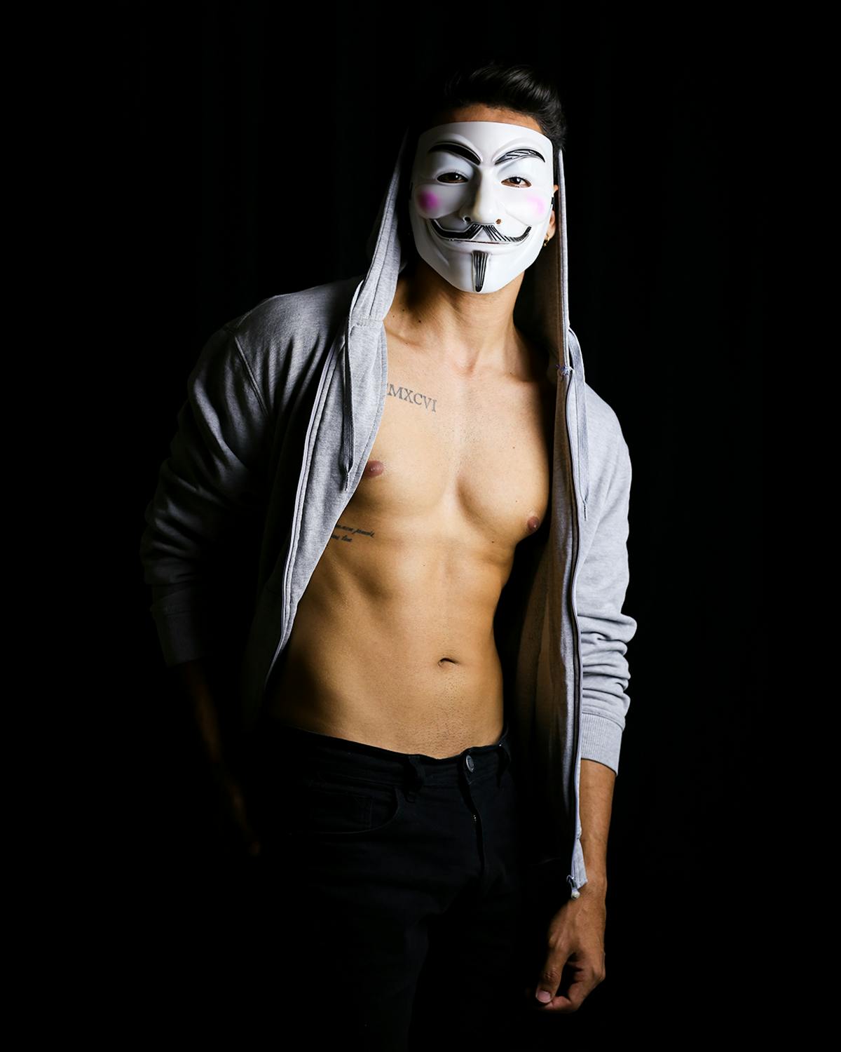 Cozy small bedroom with neutral colors, under-bed storage, and simple decor