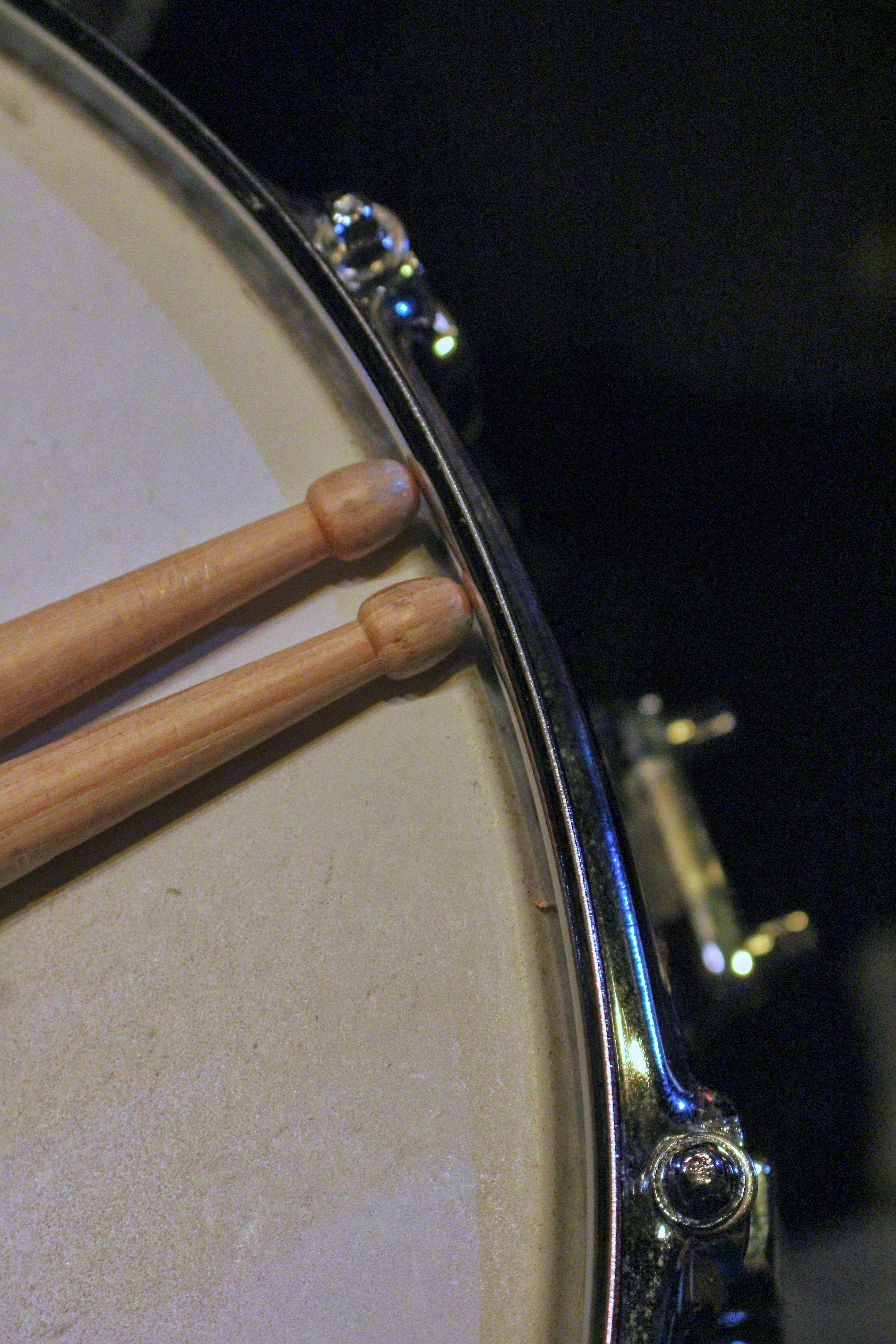 Close-up of Drum with Drumsticks on Snare Head · Free Stock Photo