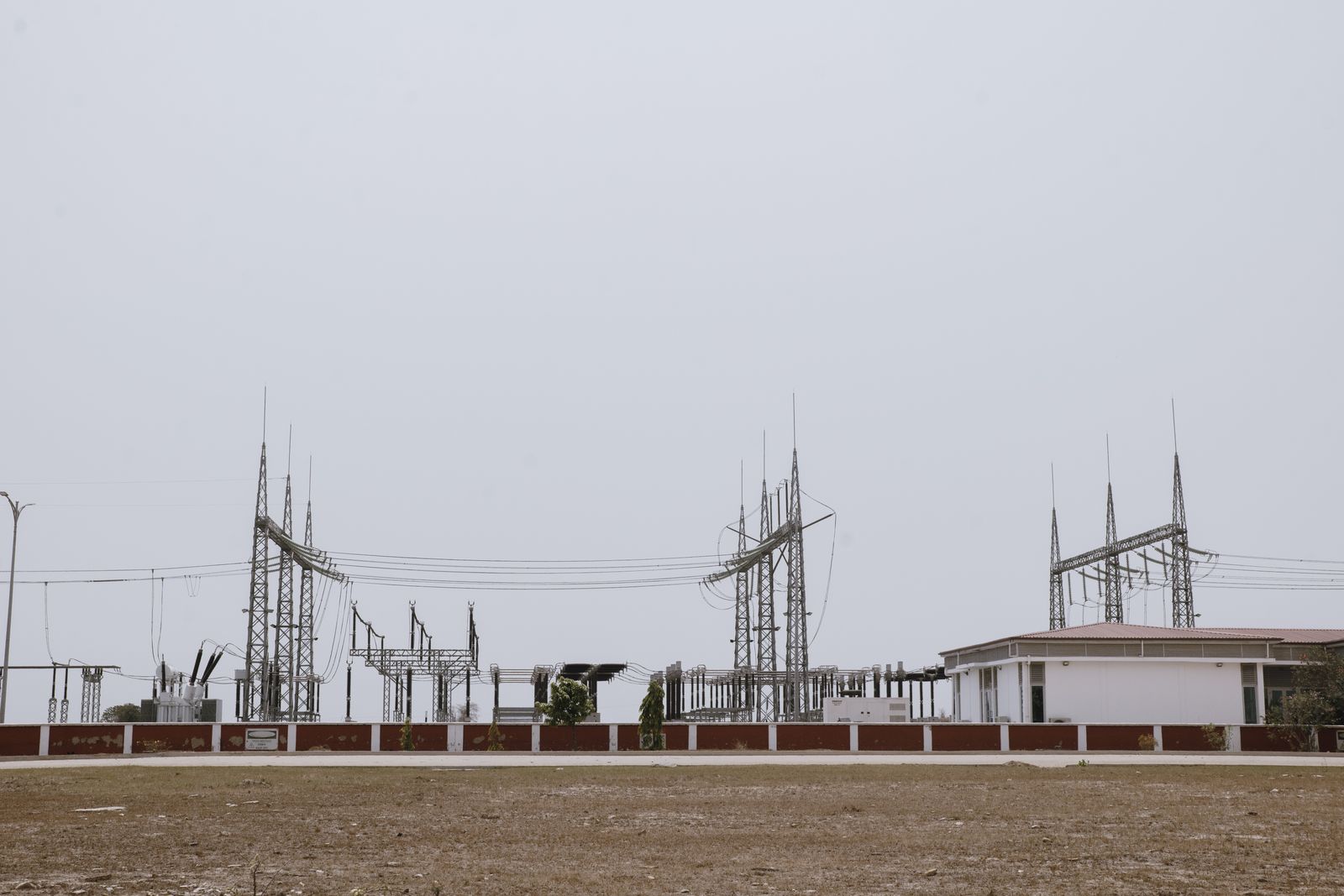 The Impending Gridlock: How National Power Bottlenecks Are Impacting Enterprise Cloud Availability and Pricing 10 hybrid IT infrastructure energy efficiency consulting: industrial power station showing utility constraints behind colocation capacity planning.