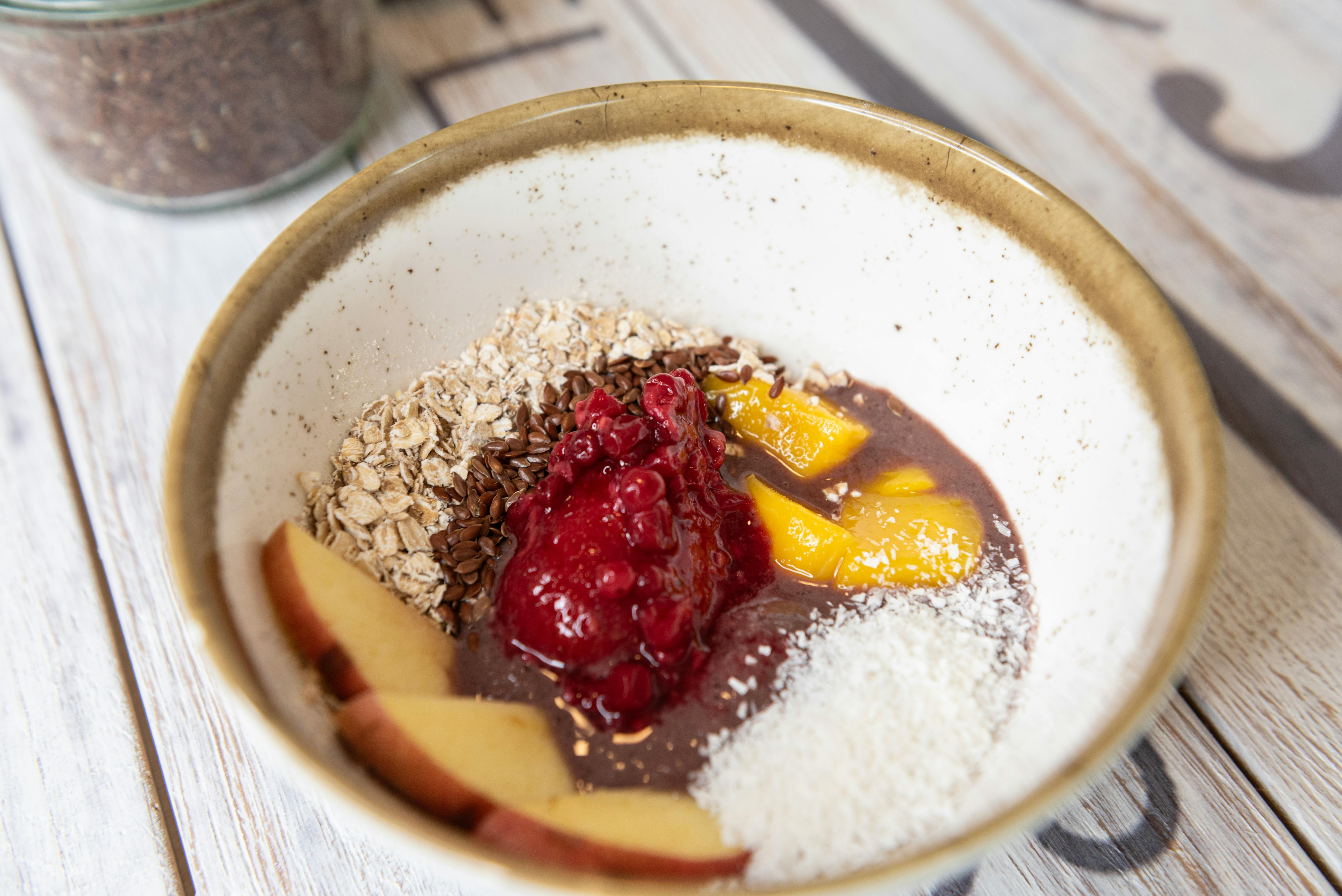 A wholesome breakfast bowl with oats, fruits, and seeds for a healthy start.