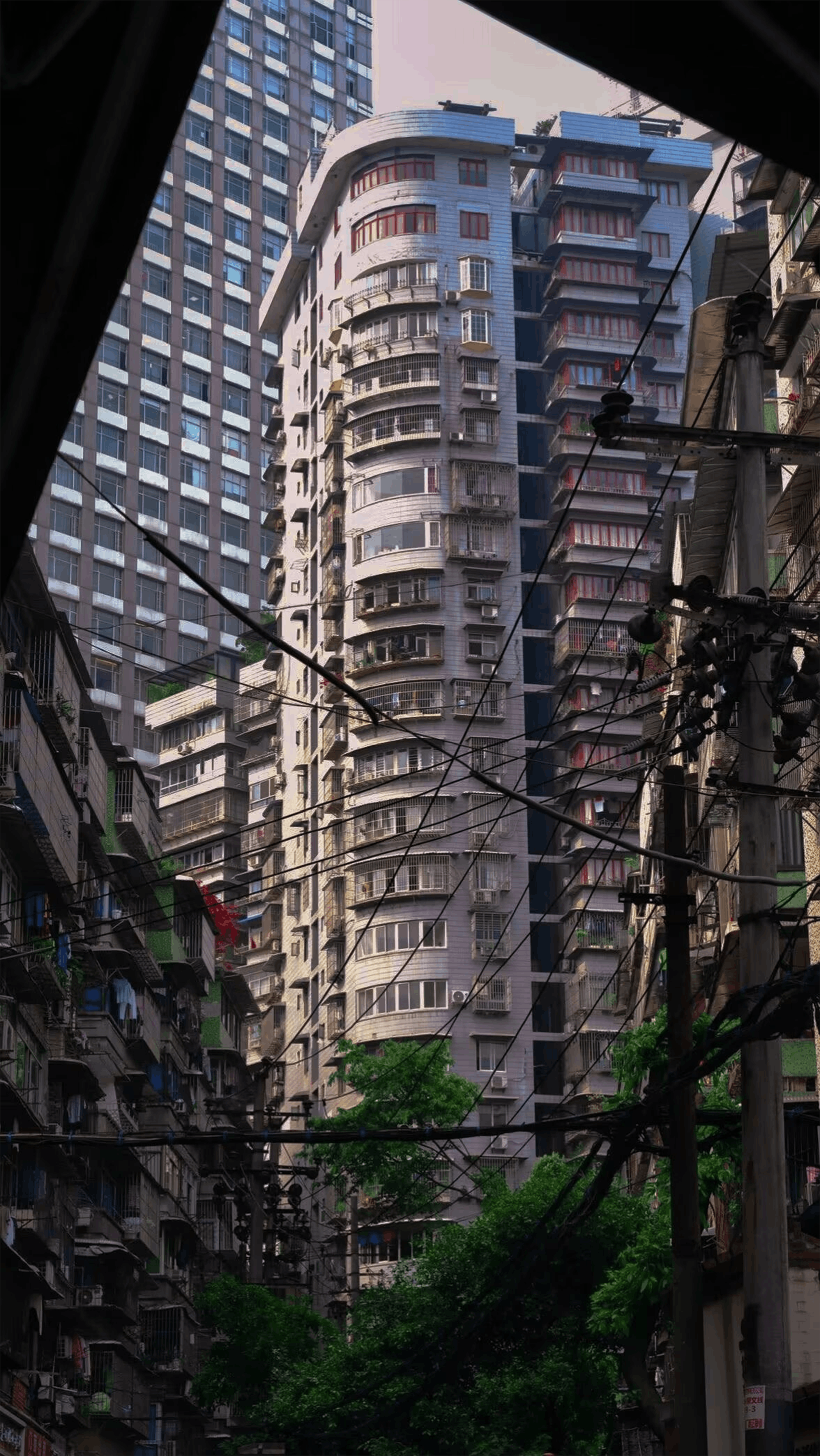 urban high rise buildings with power lines