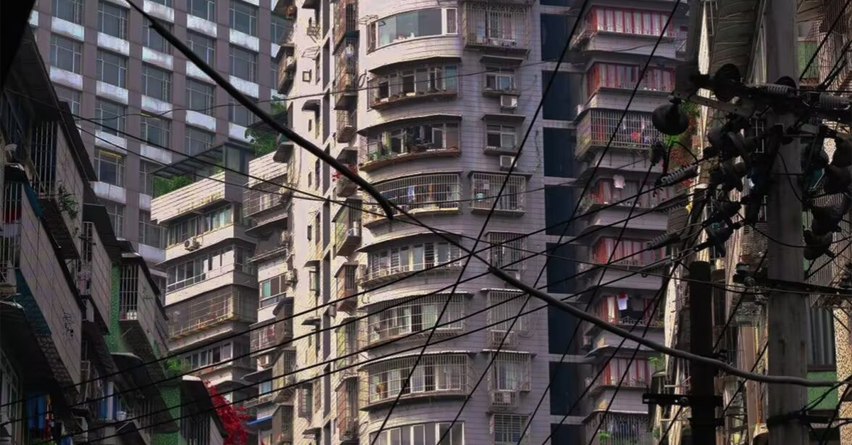 Urban High-Rise Buildings with Power Lines · Free Stock Photo