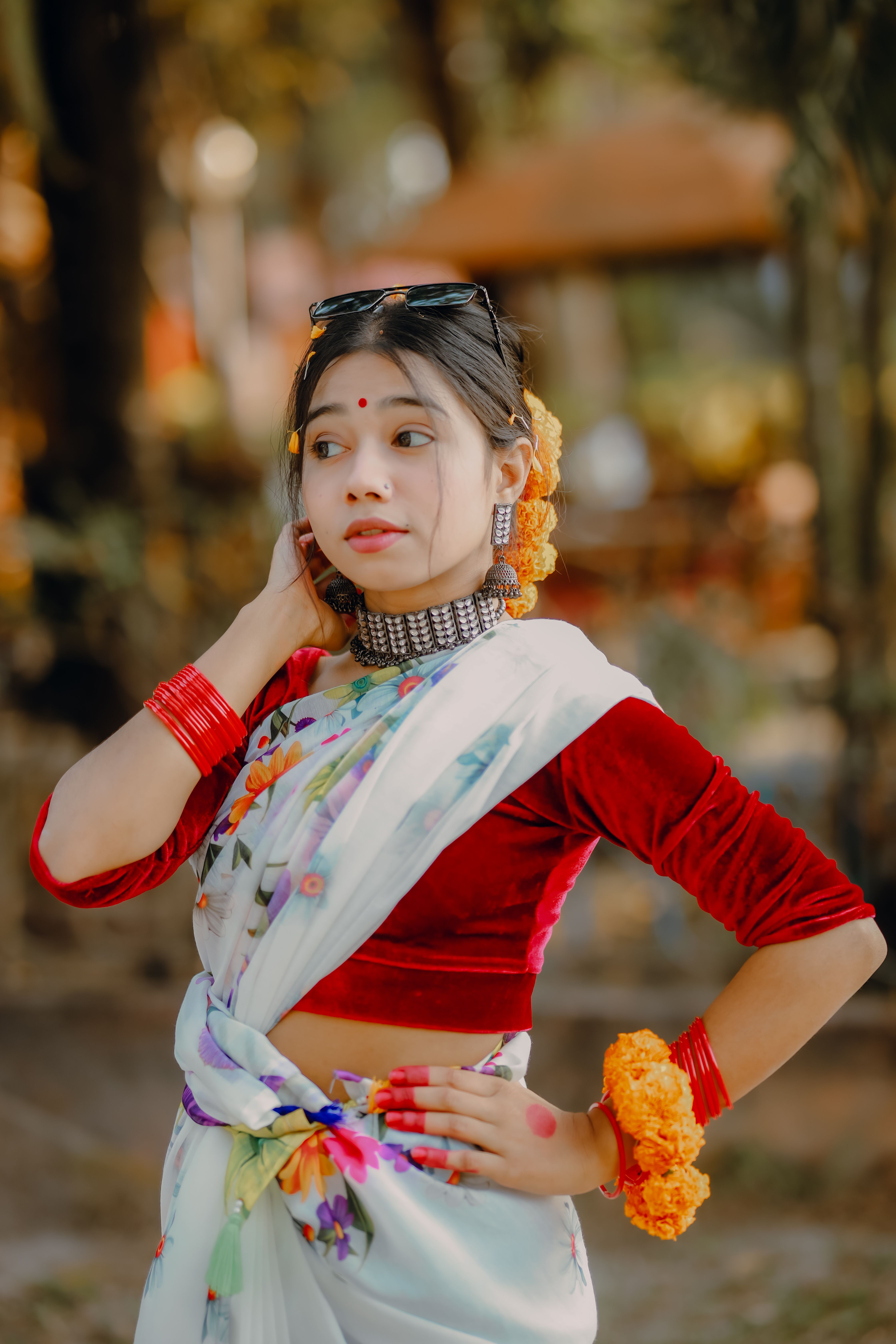 Young Woman in Traditional Indian Attire Outdoors · Free Stock Photo
