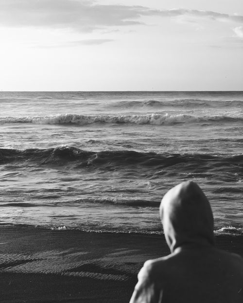 Free Serene black and white photo of ocean waves at Rabat beach during sunrise. Stock Photo