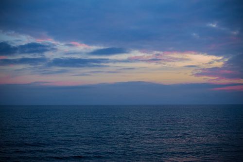 Free Peaceful sunset view over the Adriatic Sea from Grado, Italy. Stock Photo