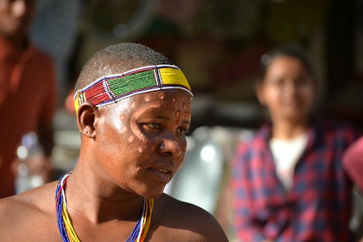 Close-up of a person in traditional attire at a cultural fair in Haryana, India.