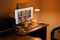 Cozy Home Office Desk with Computer and Snacks