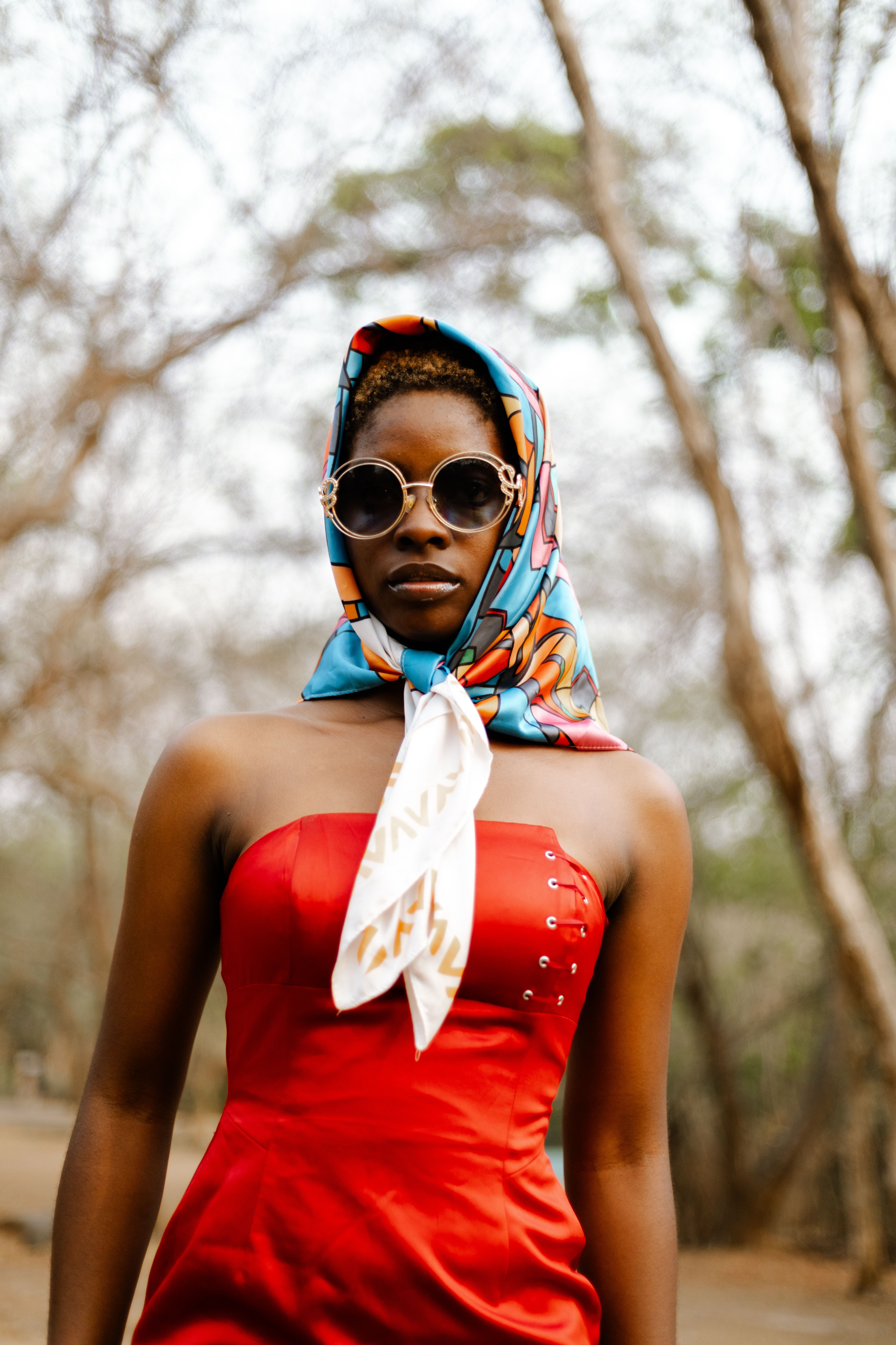 Stylish Woman in Red Dress Outdoors · Free Stock Photo