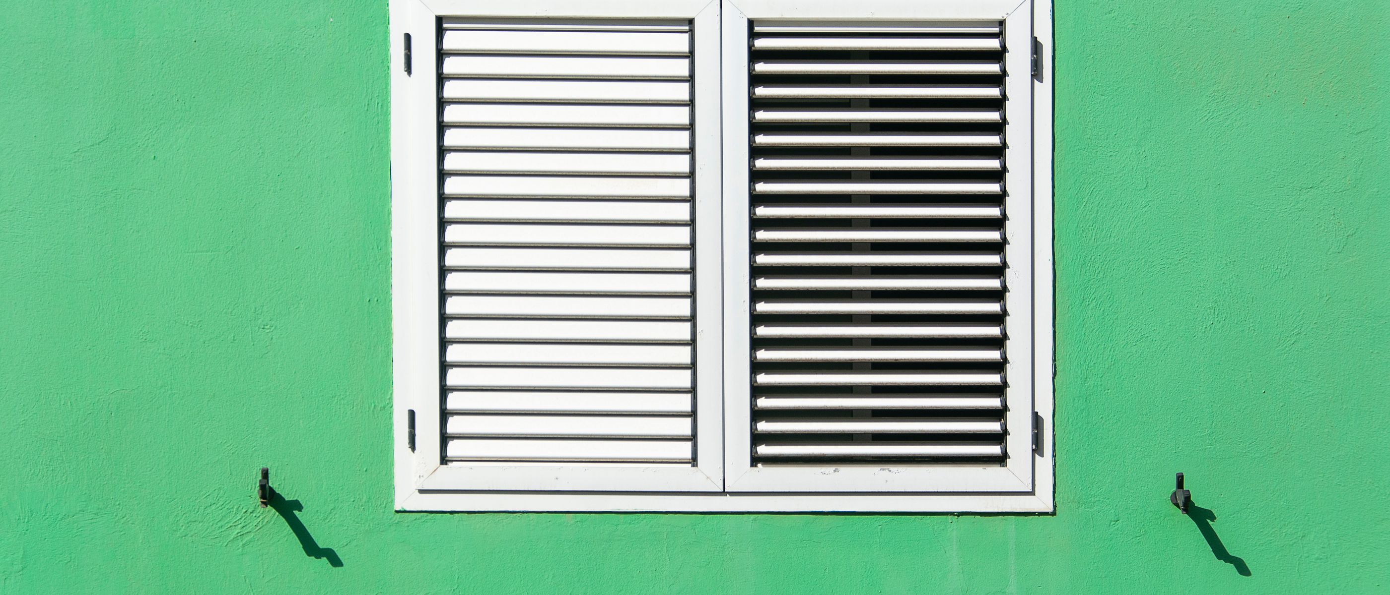 Exterior Painting in Upper Clapton — clean edges cut in around trim and sockets
