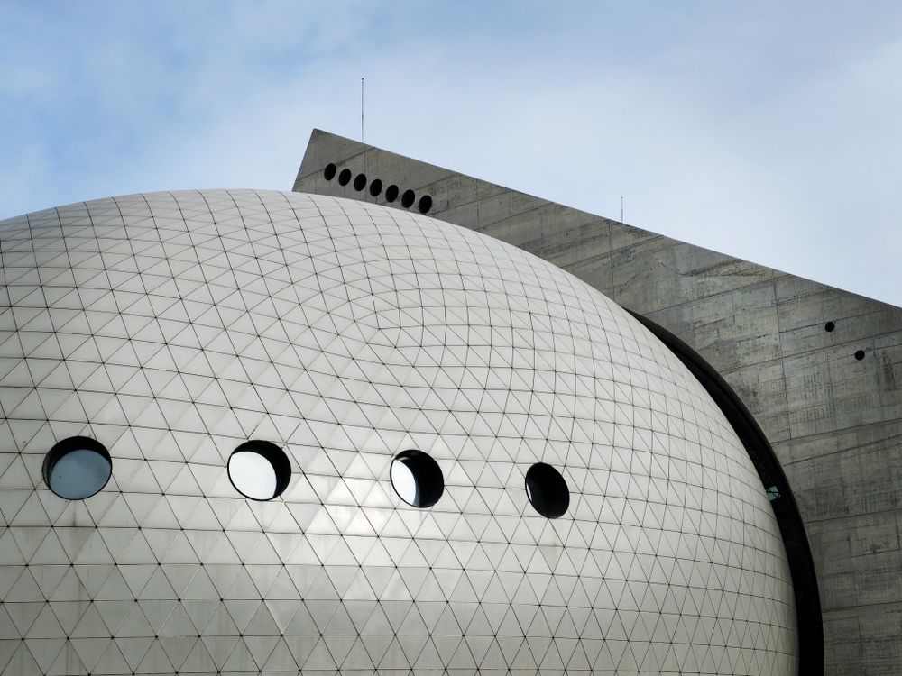 Geometric Architectural Design with Circular Windows · Free Stock Photo