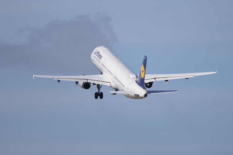 Lufthansa aircraft taking off from a German airport runway