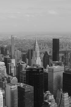 Breathtaking black and white view of Midtown Manhattan featuring the Chrysler Building and expansive skyline.