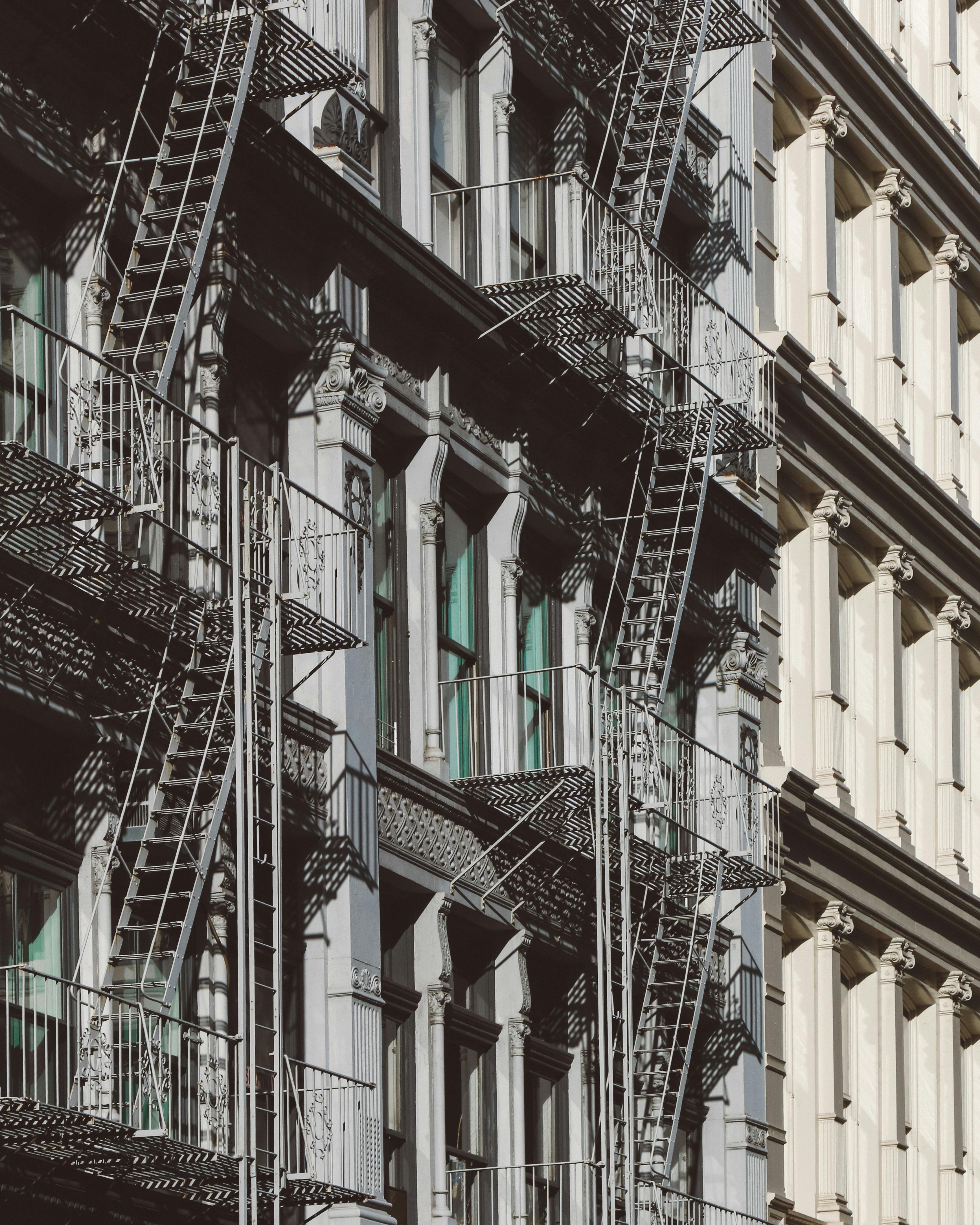 Close-up of New York's iconic apartment facades with classic fire escapes.