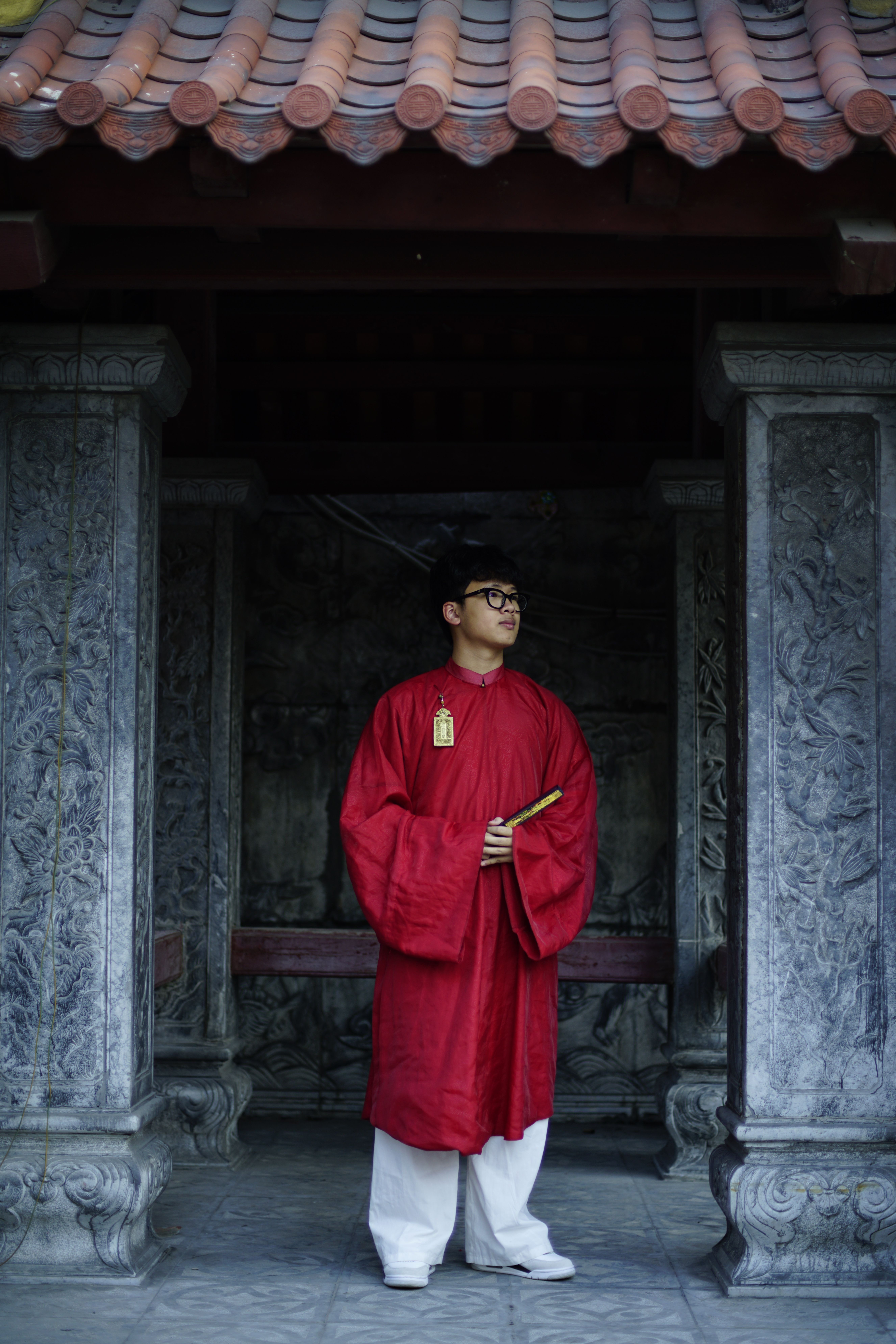 Cultural Portrait in Traditional Red Robe · Free Stock Photo