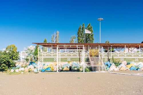 Free Vibrant outdoor stadium structure under clear blue sky in Sochi, Russia. Stock Photo