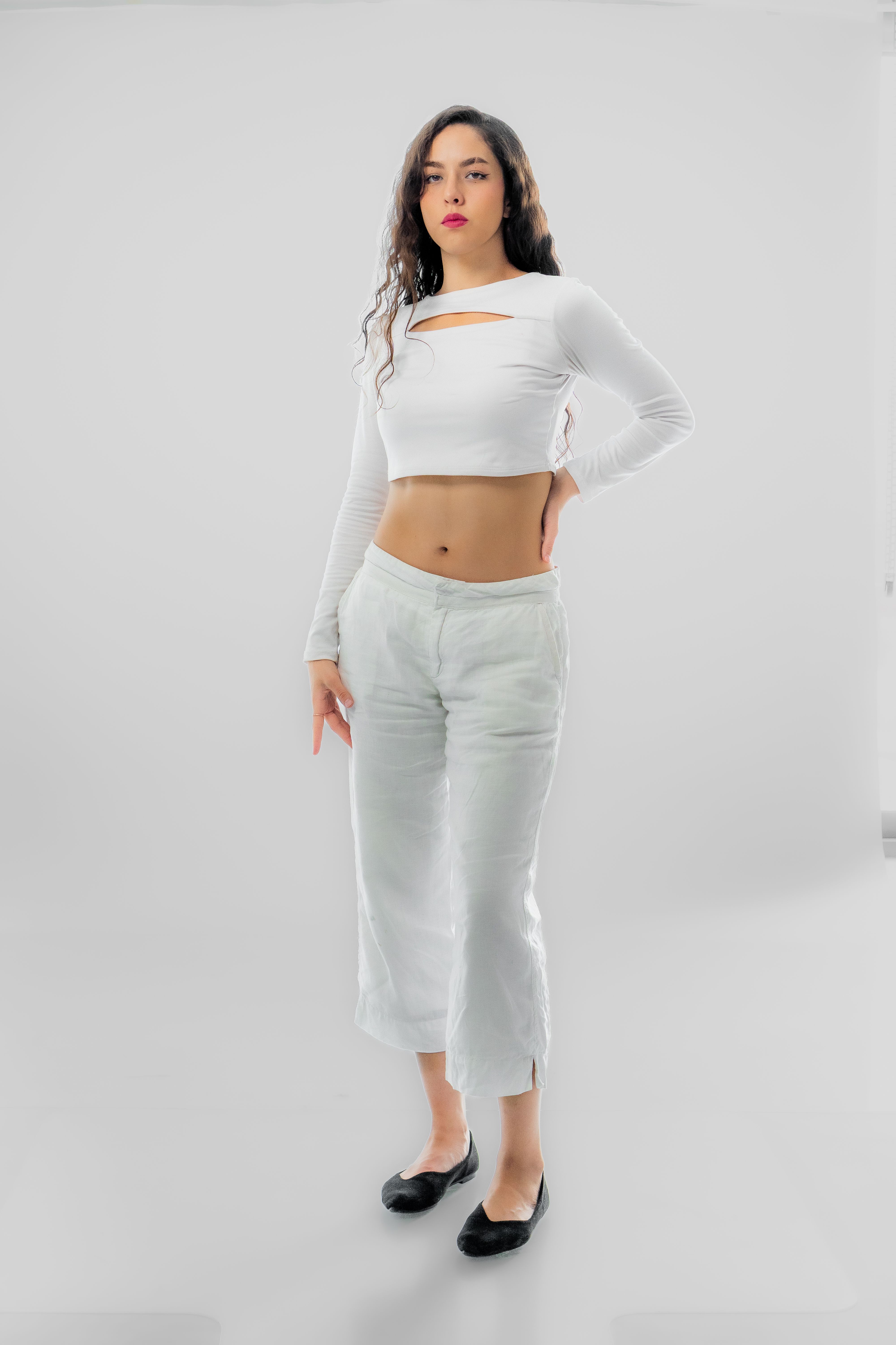 Stylish Woman Posing in Elegant White Outfit · Free Stock Photo