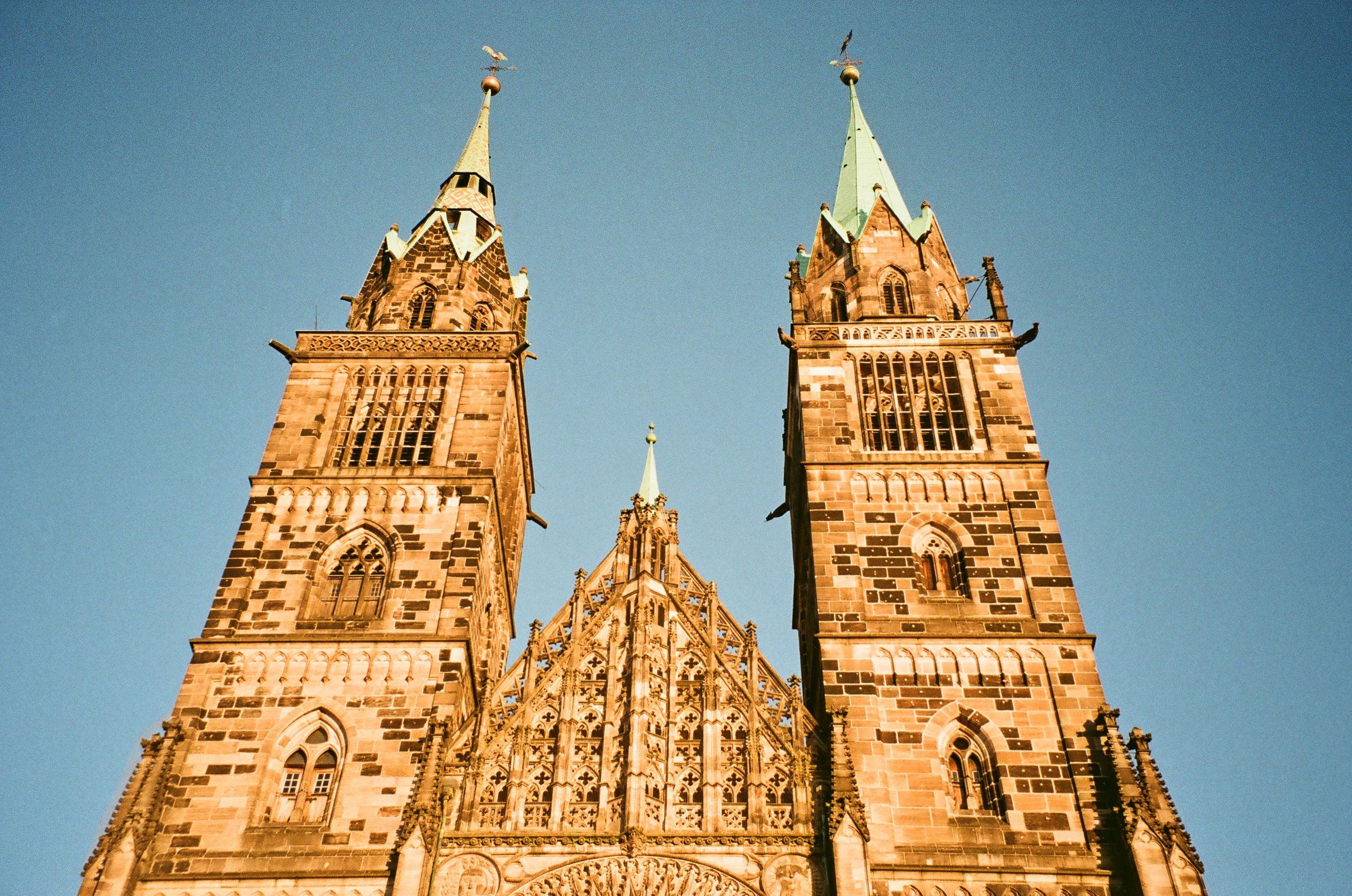 Gothic Cathedral Towers Against Clear Blue Sky · Free Stock Photo