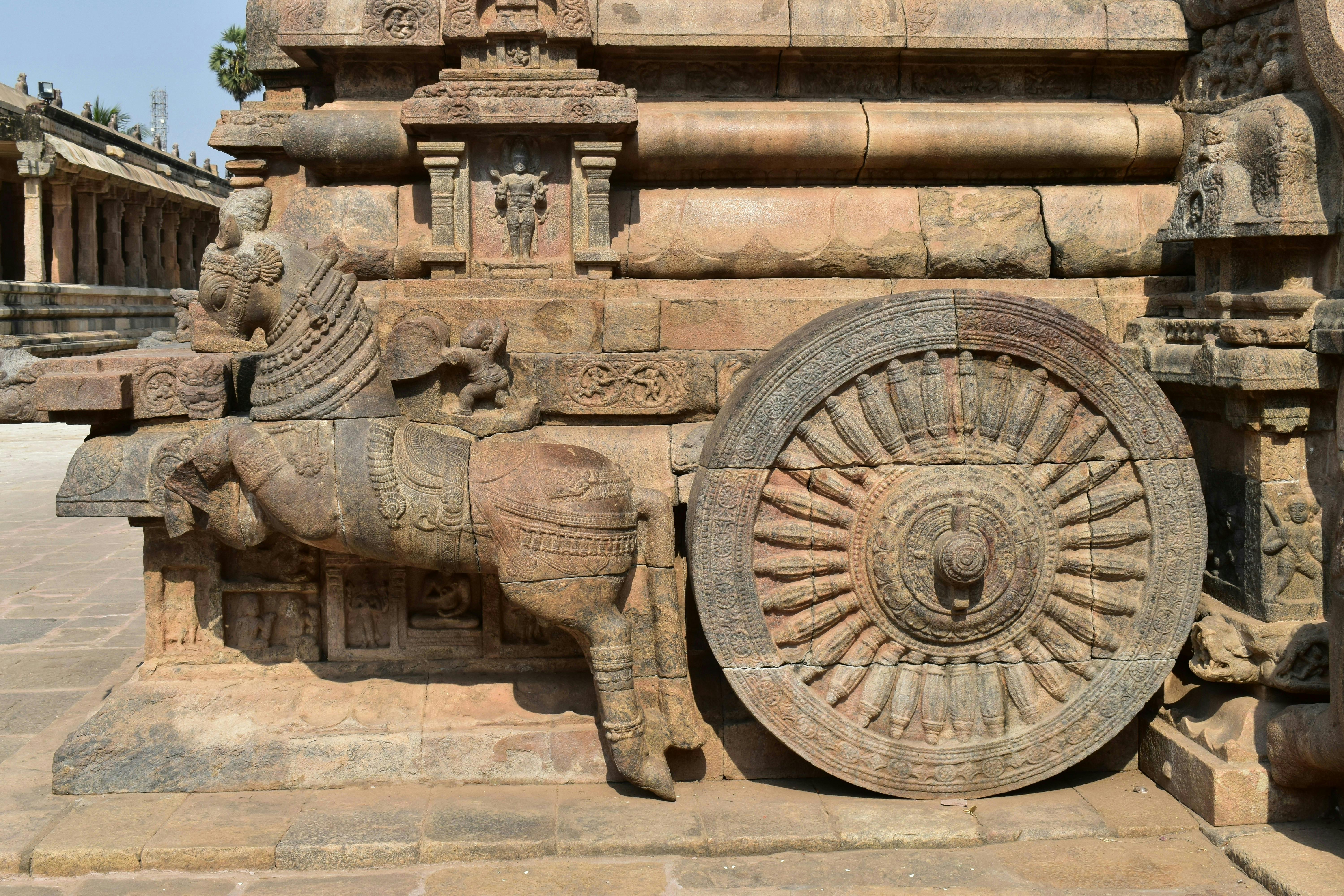 Intricate stone chariot sculpture at a historic temple in Kumbakonam, Tamil Nadu.
