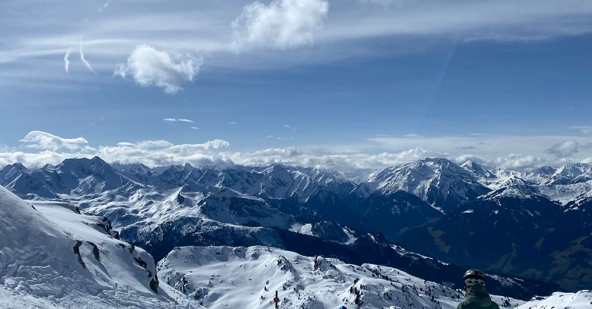 Alpine Slopes Skiers Enjoying a Sunny Day on Alpine Slopes · Free Stock Photo