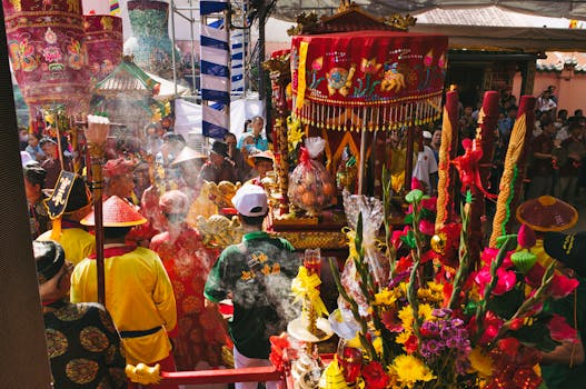 Colorful and vibrant Asian festival with traditional clothing, decorations, and a lively crowd.