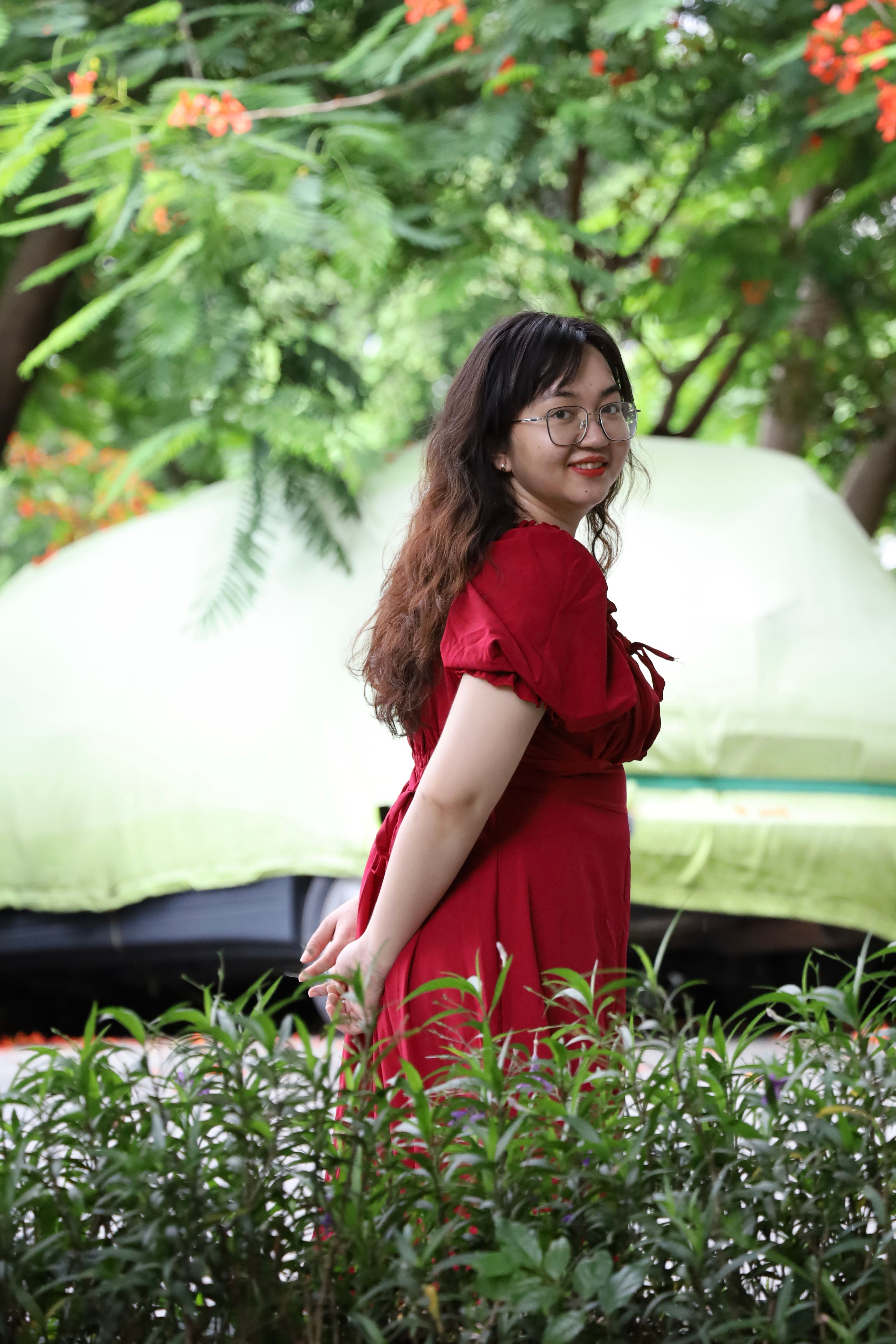 Young Woman in Red Dress Outdoors · Free Stock Photo