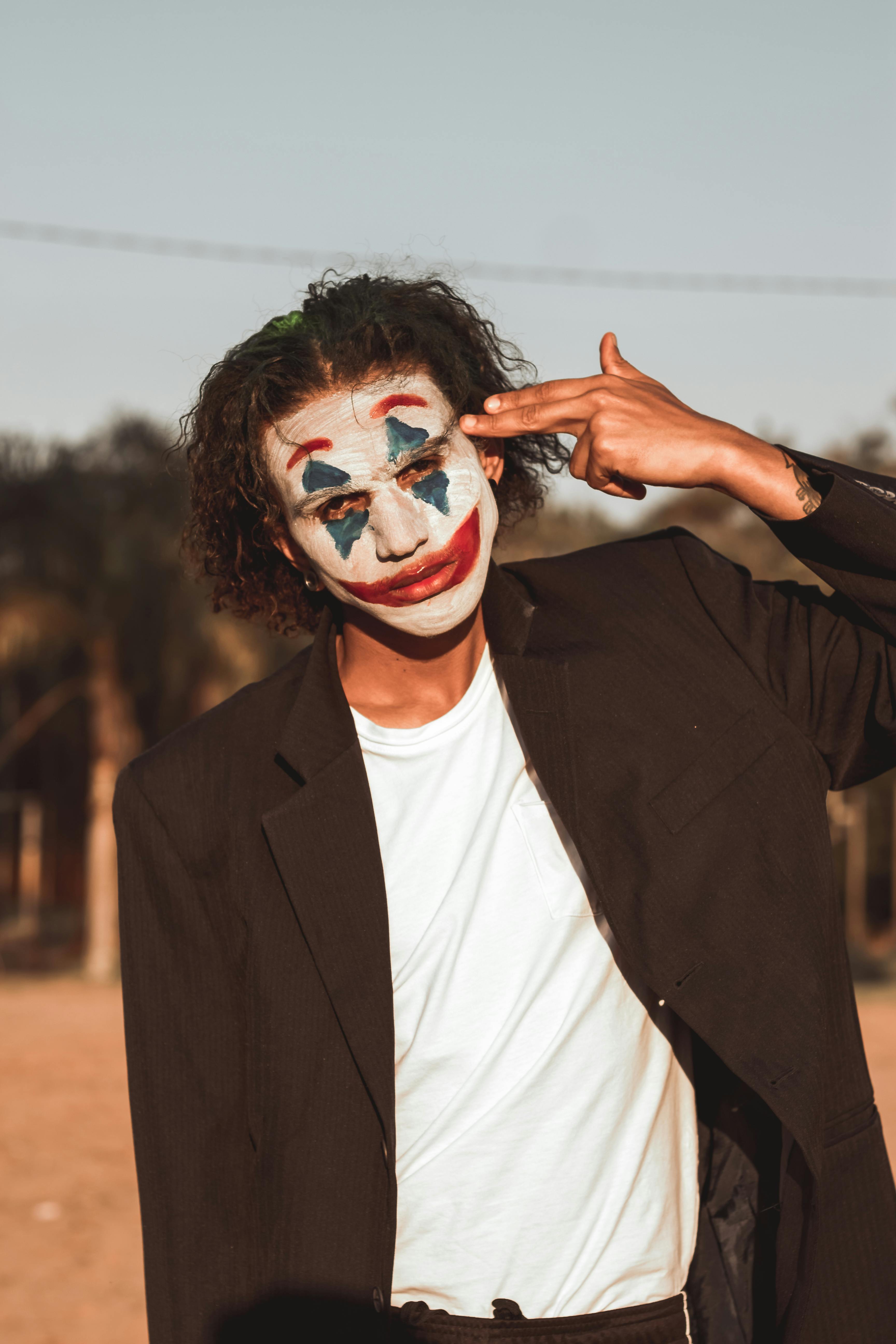 Dripping metallisk killing Man Wearing the Joker Makeup · Free Stock Photo