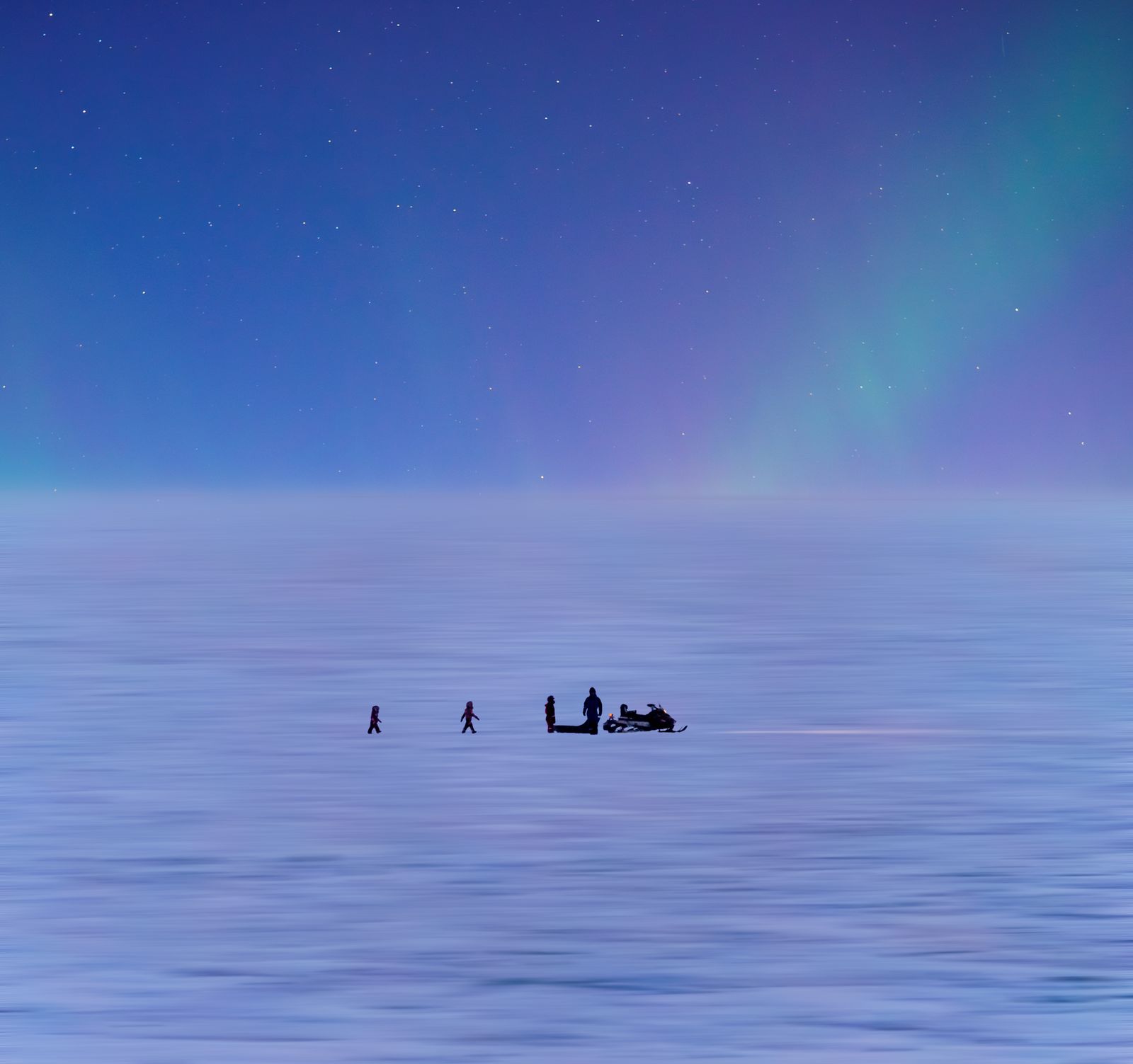 Snowmobile Aurora hunting Finland Lapland Northern Lights