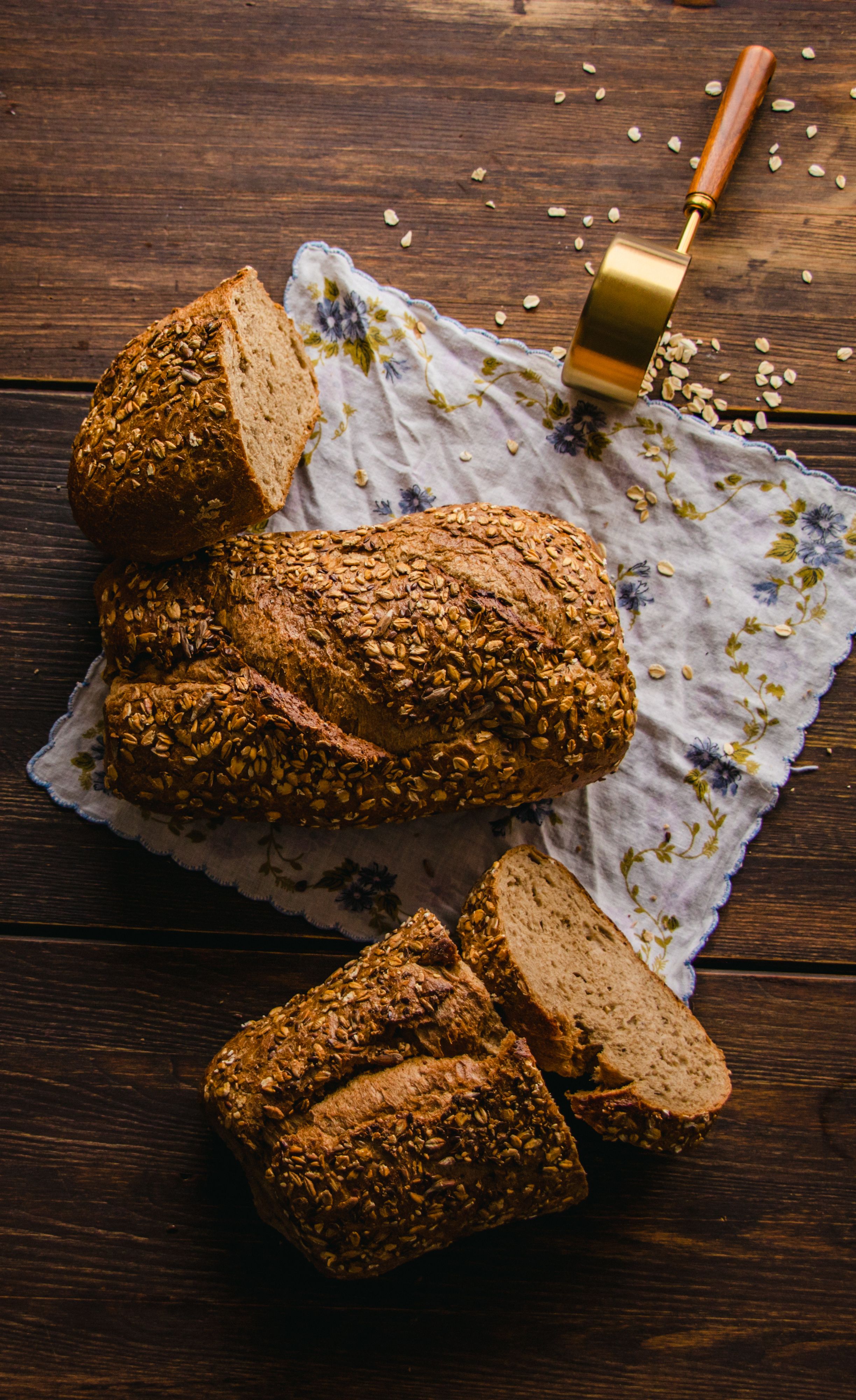 Rustic Whole Grain Bread with Oats on Wooden Table · Free Stock Photo