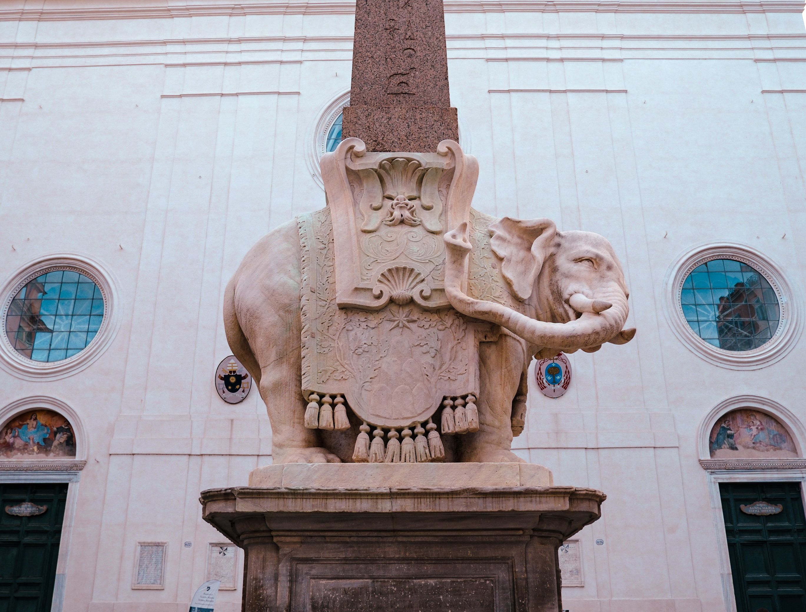 Majestic sculpture of elephant and obelisk by Bernini in Rome, Italy. Captivating architectural detail.