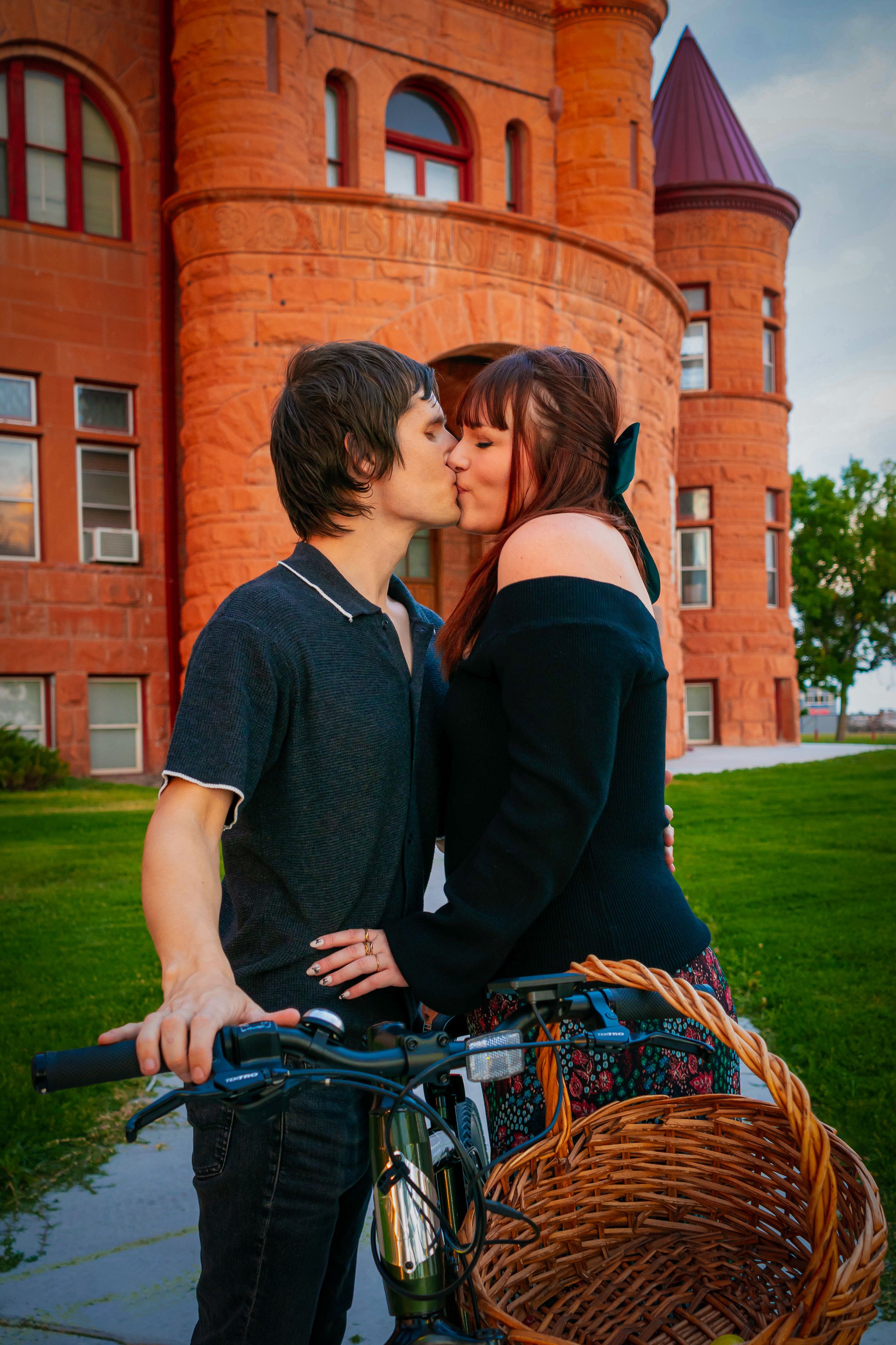 Romantic Couple Kissing Outdoors by Historic Building · Free Stock Photo