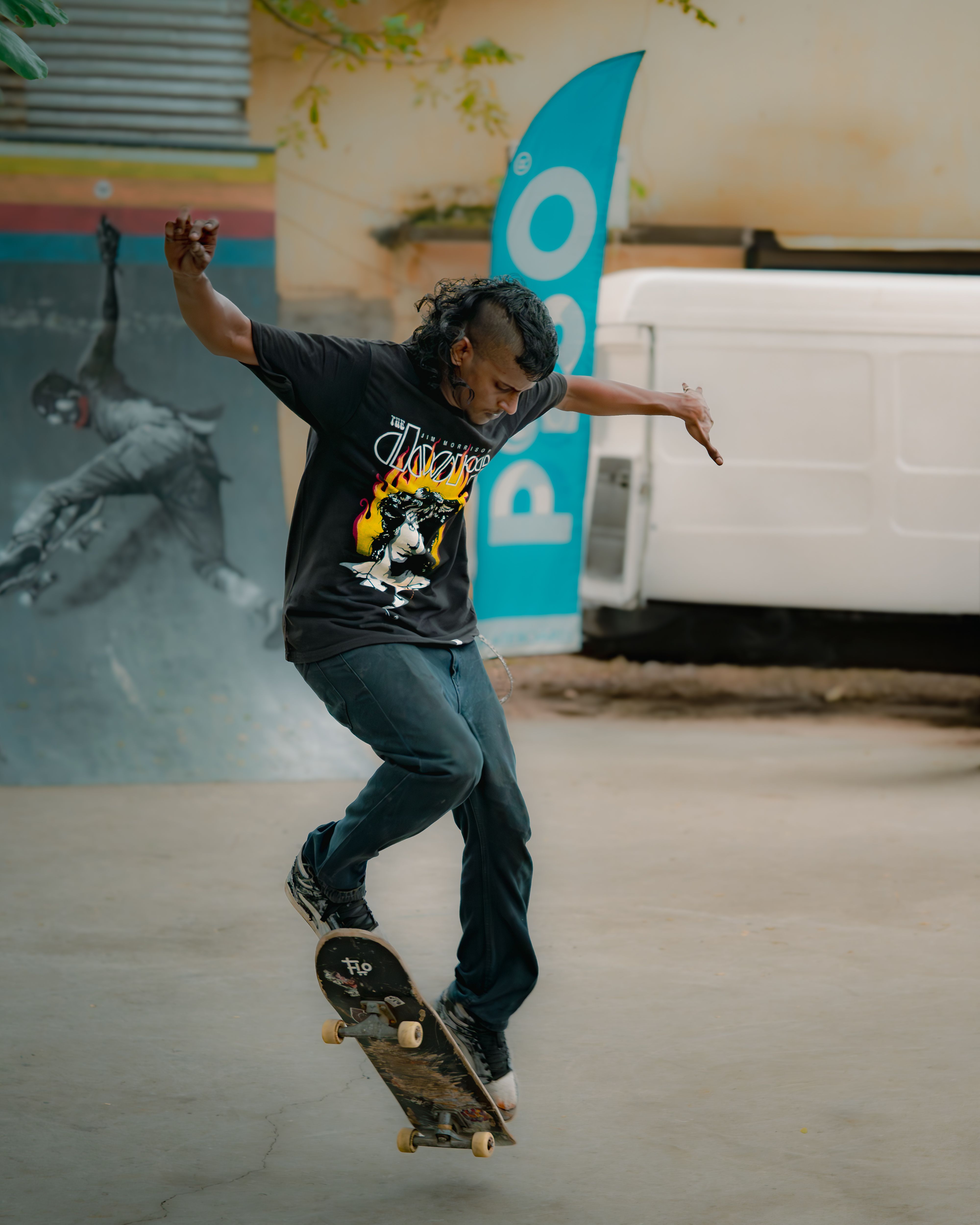 Young skateboarder executing a trick in an urban setting. Street style and dynamic motion.