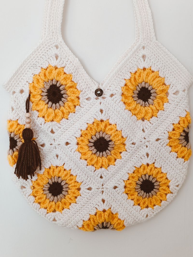 White crochet tote bag with yellow sunflower granny squares