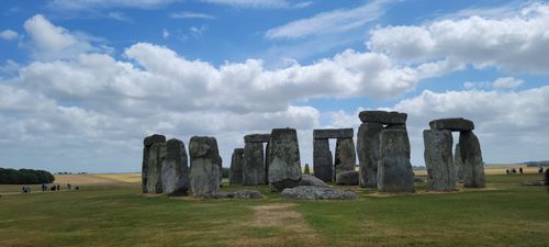 Free Explore the ancient Stonehenge monument in London with a bright, cloud-filled sky. Stock Photo