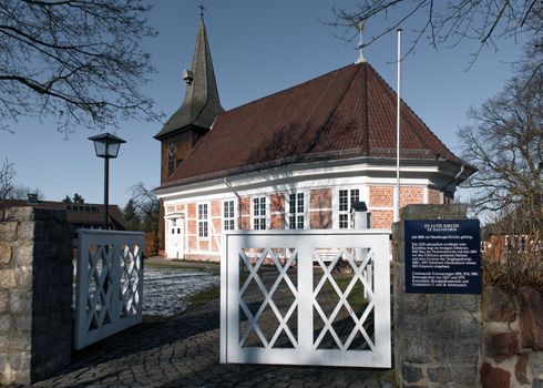 Idyllic medieval church architecture in Geesthacht, showcasing tranquil old town charm.