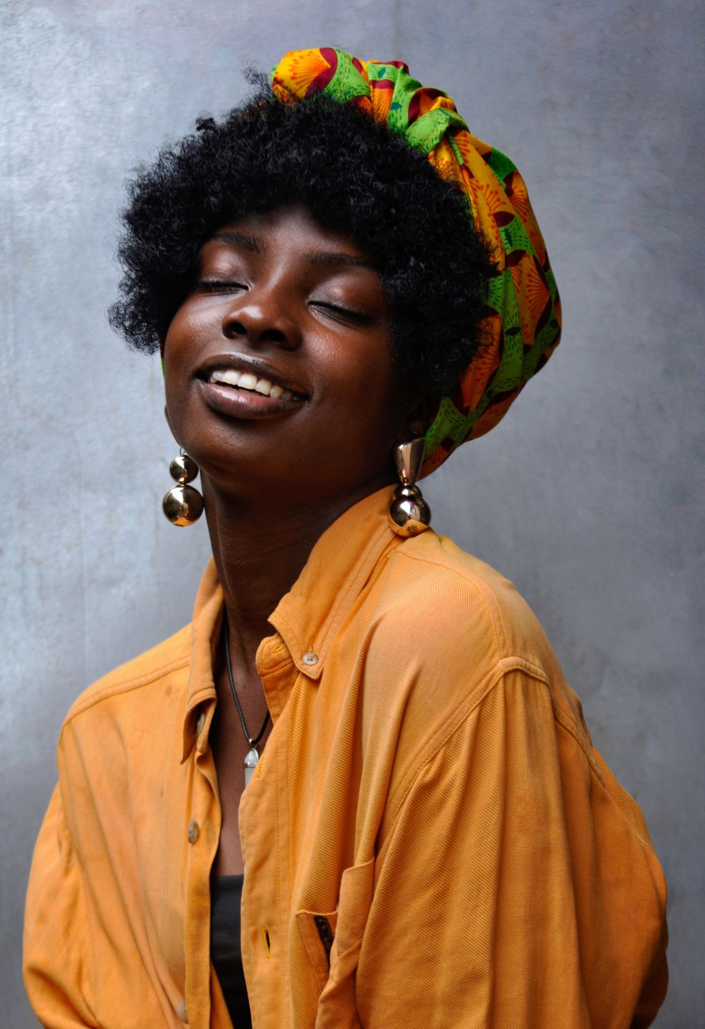 Adinkra, Boucles en laiton martelé