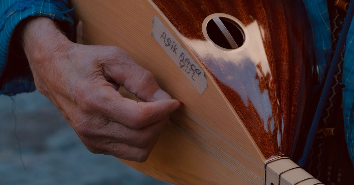 String Instrument Up Clode Close-up of a musician playing a traditional string instrument · Free ...