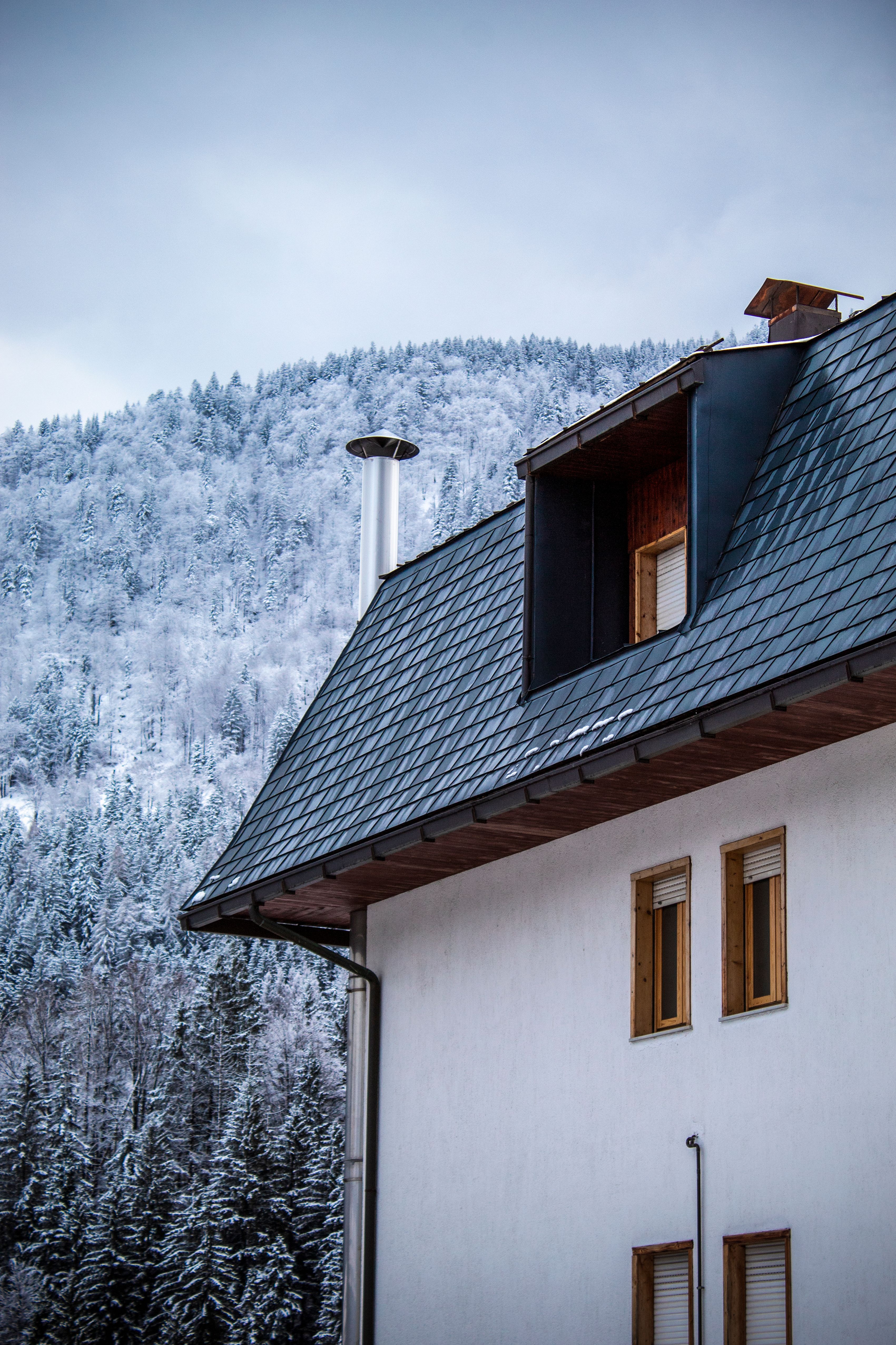 Snowy Alpine House in Tarvisio, Italy · Free Stock Photo