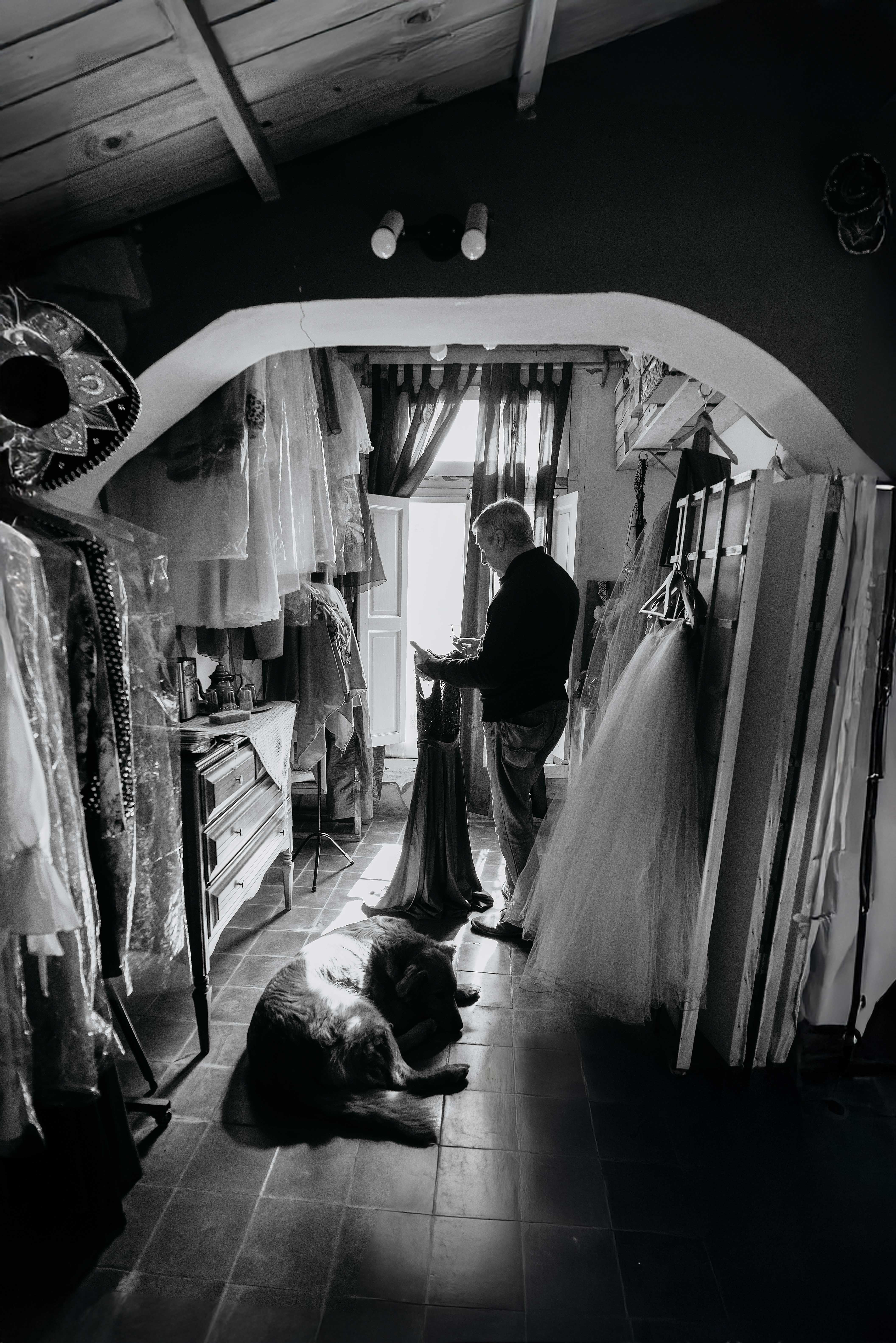 Tailor Working in Vintage Black and White Atelier · Free Stock Photo