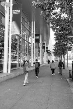People walk by a Data AI Summit venue in San Francisco.