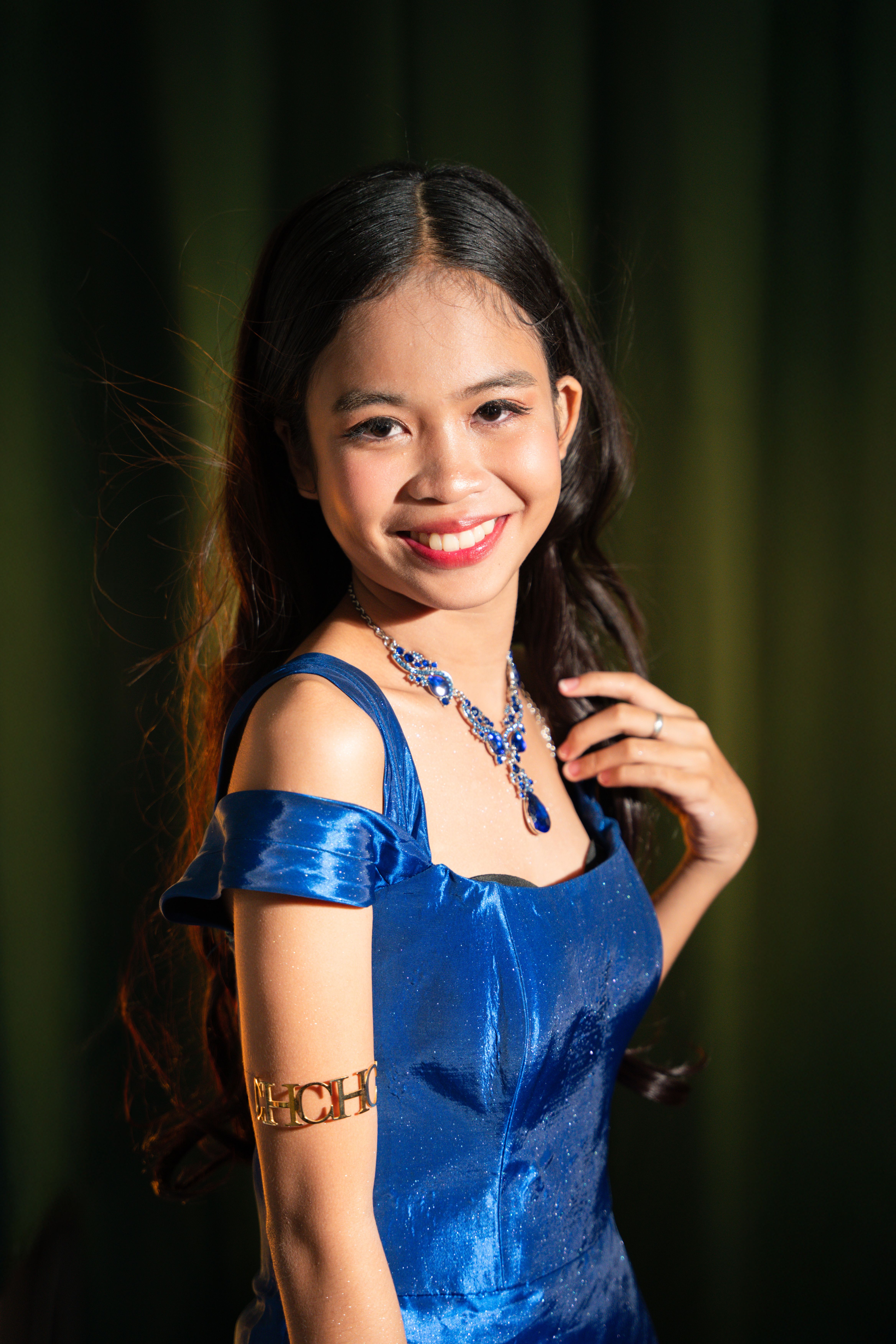 Elegant Woman in Blue Dress with Jewelry · Free Stock Photo