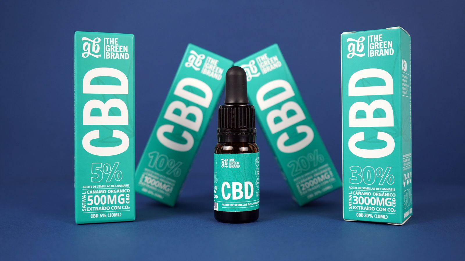 High-quality CBD oil products in branded packaging against a blue background.